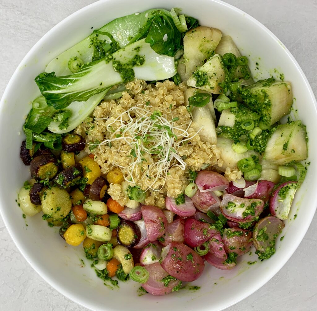Quinoa Buddha Bowl with ingredients separated in a bowl