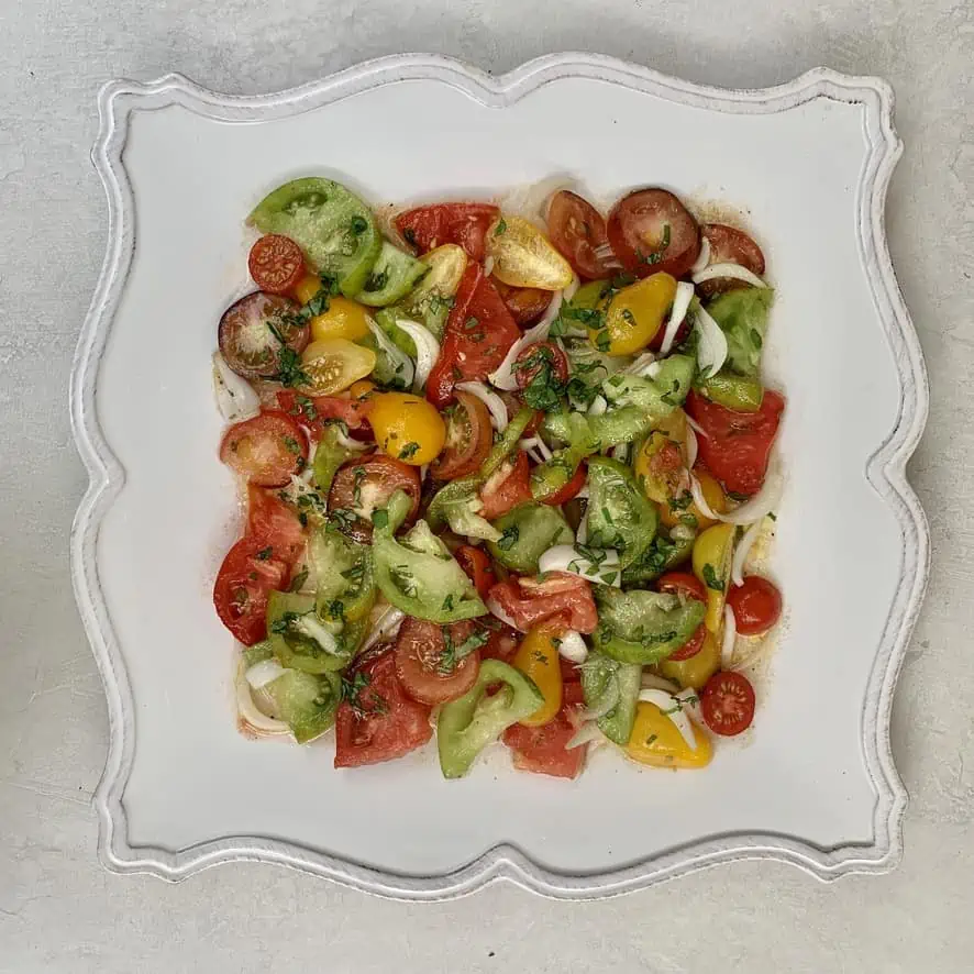 Assorted Garden Tomato Salad on a decorative plate