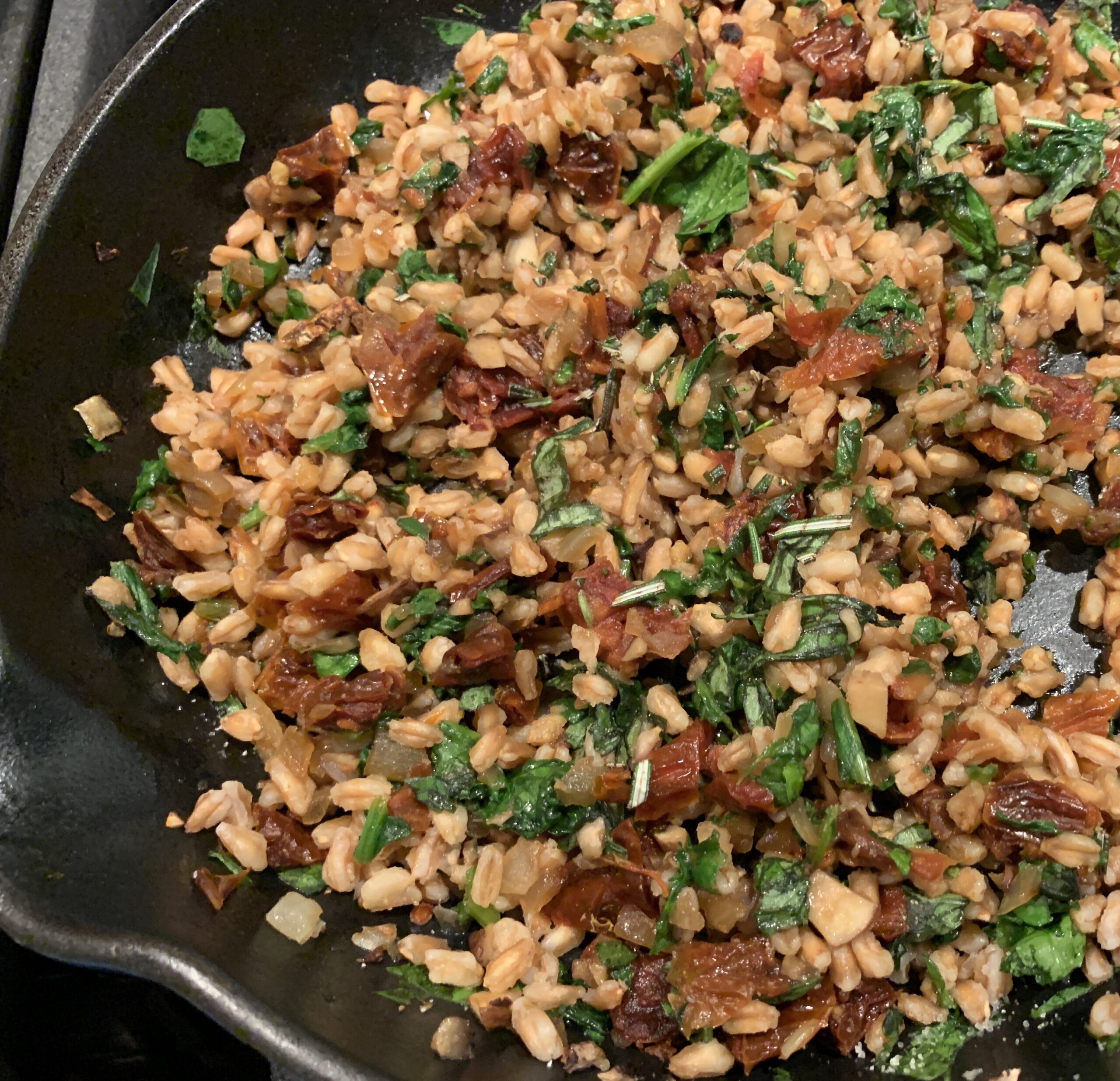 Farro stuffing mix in pan.