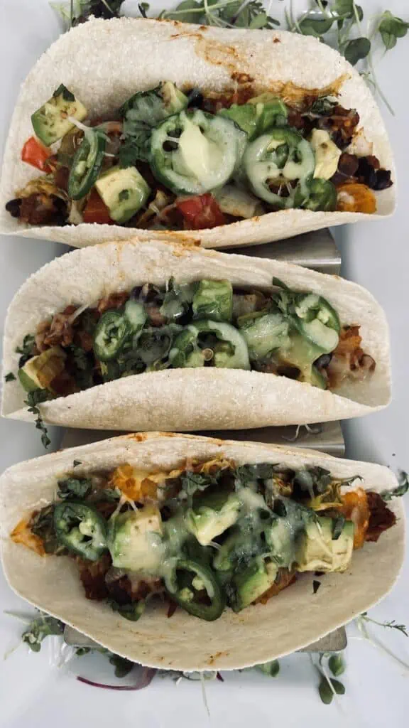 Plant-Based Meat Tacos with Cabbage, Black Beans & Peppers ready to eat