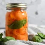 pickled cantaloupe in a mason jar